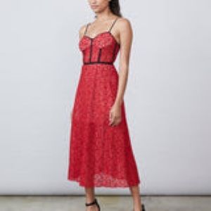 Red lace Schwartz dress with pockets.